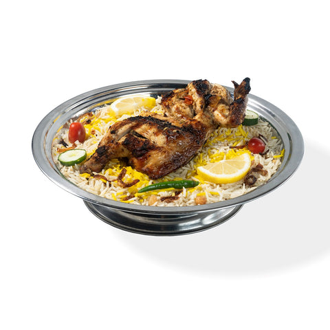 Abu Mubarak Grilled Chicken Mandi featuring a spice-marinated, flame-grilled quarter-chicken on a bed of aromatic yellow and white smoked basmati rice, garnished with lemon, cucumber, and cherry tomatoes on a silver platter.
